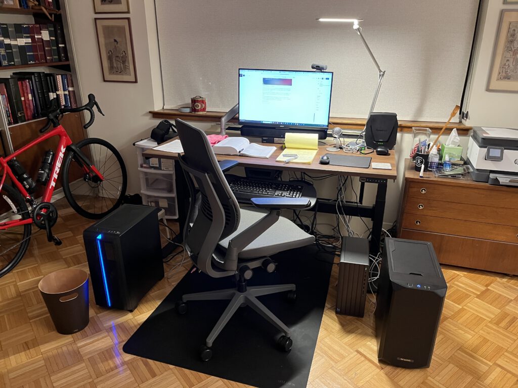 IT professional home office setup with dual PC towers