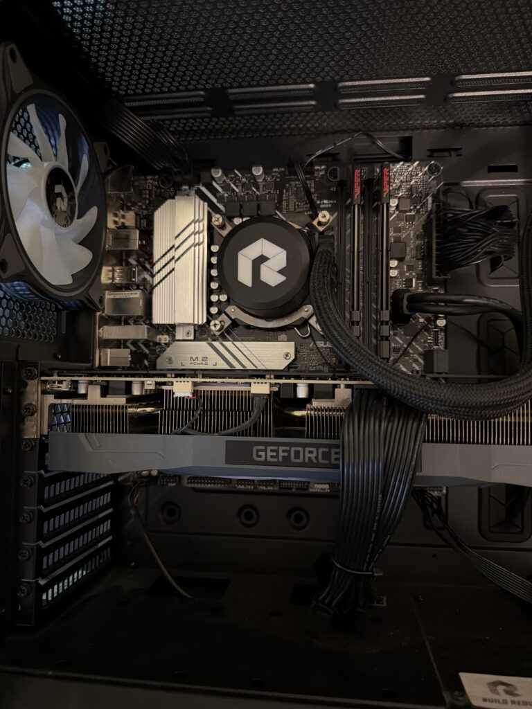 Gaming PC motherboard during BIOS chip failure diagnosis and repair